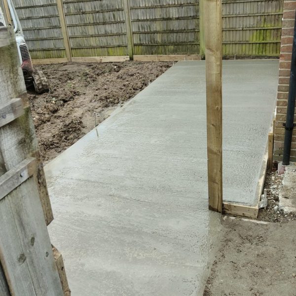 Concrete pour for s strong foundation: patios on a budget