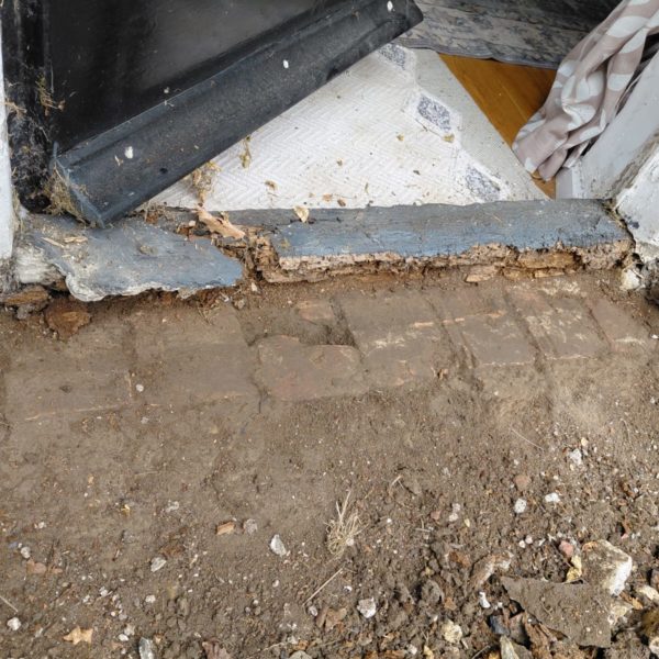 Block paving on a Grade I listed building